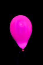 50 Ballons ovales rose fluo Ø13 cm